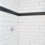 thumbnail slide for Shower with white and black tiles